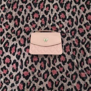 Pink Quilted Handbag with Butterfly Accent